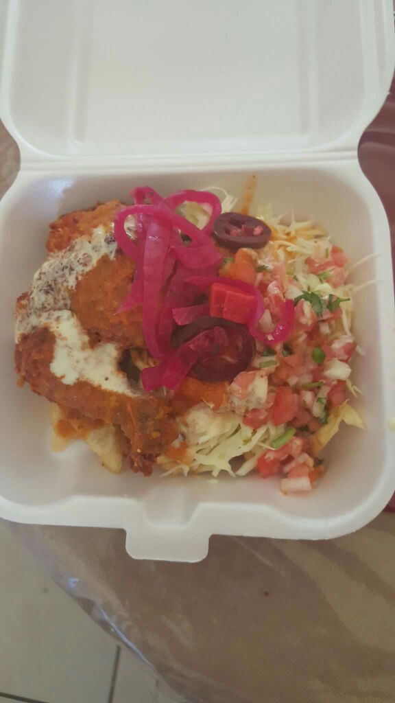 Pollo con tajadas comida Hondureña