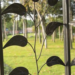 10' x 10' Metal Patio Gazebo with Netting & Tree Motifs