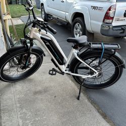 Magic Cycle Cruiser Pro Mid Step-Thru electric cruiser bike