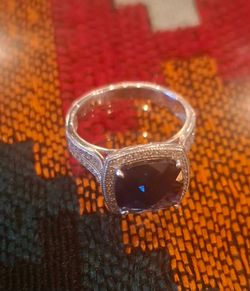 Silver Ring with Purple Stone and Halo Setting
