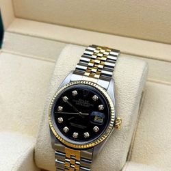 Rolex Datejust 36 36mm black diamond dial yellow gold and stainless steel jubilee bracelet box appraisal