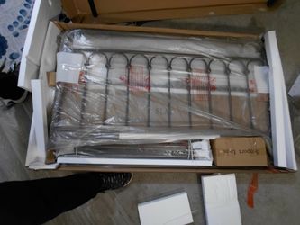 Brand New Still in box! Full size brown iron bed frame with head/foot board.