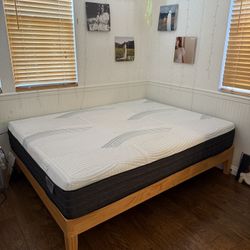 Queen bed with wooden base