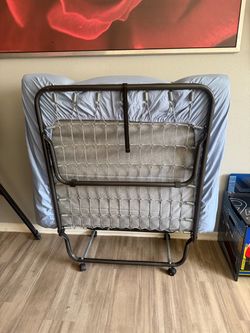 Folding/roll away bed