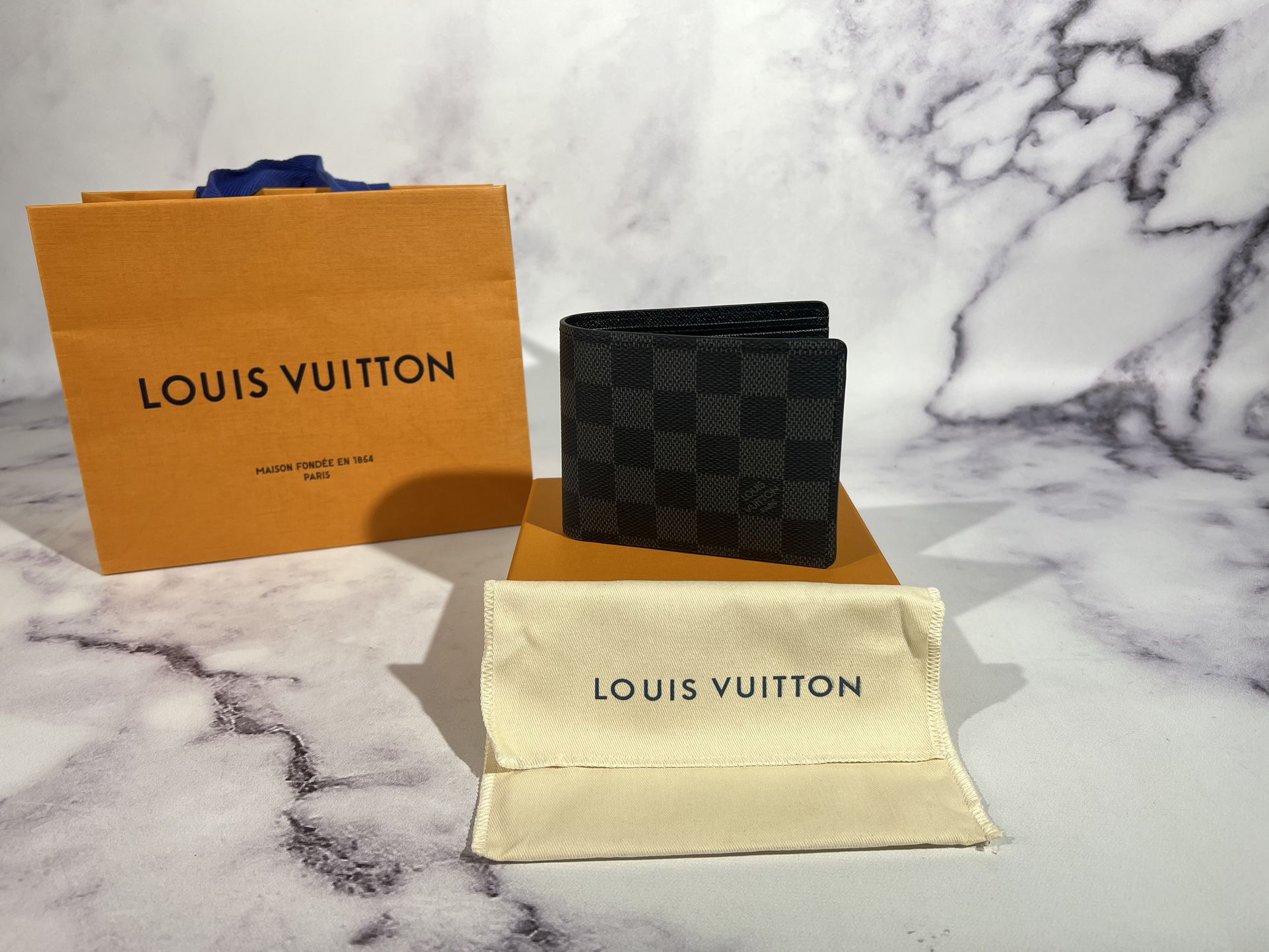 Men's Louis Vuitton Navy Blue Multiple Wallet for Sale in Brooklyn, NY -  OfferUp
