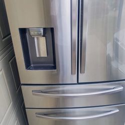 Samsung 4 Door Stainless Steel Refrigerator  500.00 Obo.