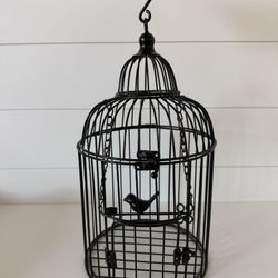 Cage with a little bird"Firm Price”