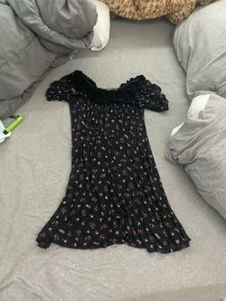 black sun dress with flowers