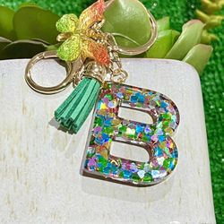 New Letter Alphabet Keychain Crystal Resin  (Nuevo).  NO TRADES.   NO SHIPPING.  (EAST PALMDALE)