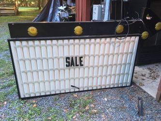Roadside Sign with some letters