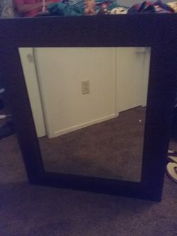 Dark brown mirror