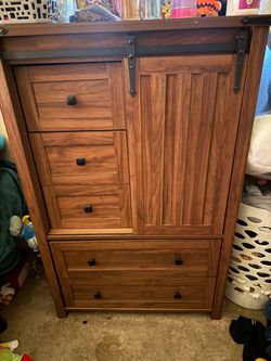 Dresser with sliding door