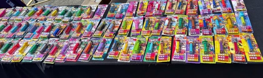 Lot of 84 miscellaneous Pez Dispensers- New old stock in packaging