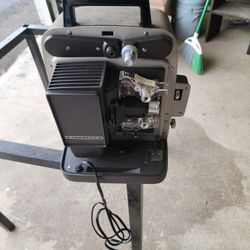 Bell And HOWELL 8MM PROJECTOR WITH SCREEN