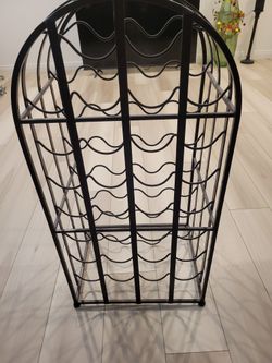 Wine Rack Holds 30 Bottles Brand New Dark Brushed Bronze

8 Rows 

Measurements 

34" High 17" W 13.5" D