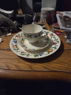 Porcelain Tea Cup, Saucer, and Plate Set