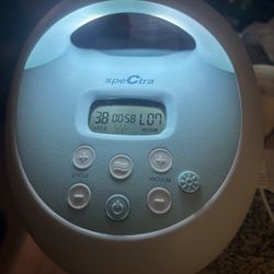 Spectra S1 Plus Electric Breast Pump.  It features a rechargeable battery for portability.   The pump has a built-in night light with adjustable brigh