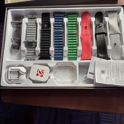 Smart watch with seven different bands and earbuds