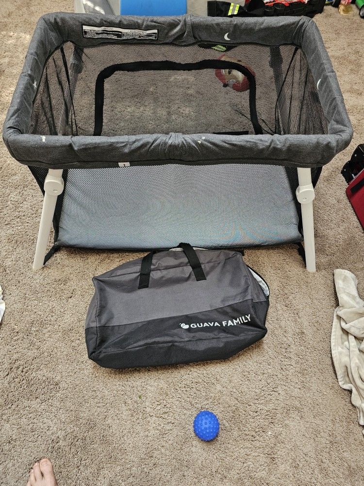 Guava Lotus Travel Crib with Lightweight Backpack Design