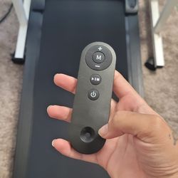 Walking pad with height adjustable table