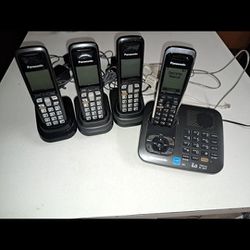 Panasonic cordless phone with 4 phones and base 