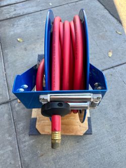 Coxreels TSH-N-575 Spring Rewind Truck Mount Air and Water Hose Reel with (1) Low Pressure 3/4" x 75' Hose - 300 PSI