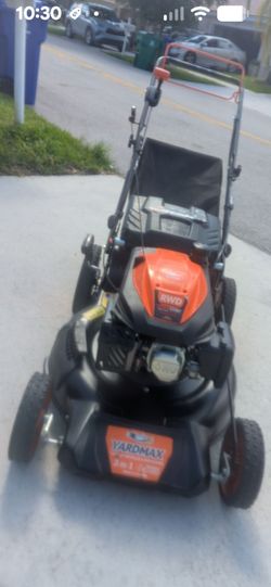 Lawn mower/ Yardmax 3-in-1 Rear Wheel Self Propelled 201cc 6 Speed Almost New Condition!