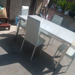 Table And Four Chairs