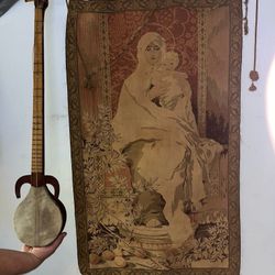 Antiques For Sale Tapestry and Old Guitar Looking Thing lol