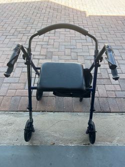 Wheeled walker with Seat, Brakes, and Basket