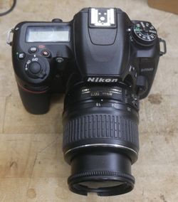 Nikon D7500 DSLR Digital Camera W/ 18-55m Lens  USED TESTED. DOES TAKE PICTURES, BUT IT SAYING ERROR ON THE SCREEN IM NOT SURE WHAT IT IS. LENS HAVE A