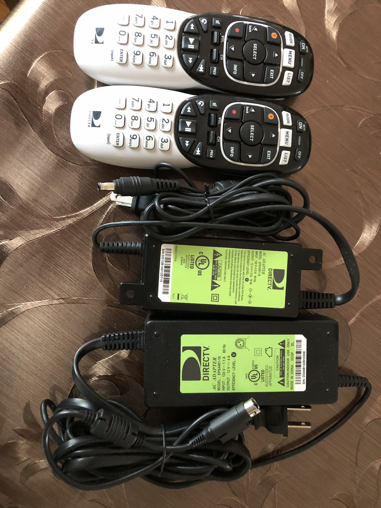 Directv 2 Remotes and 2 Power adapters