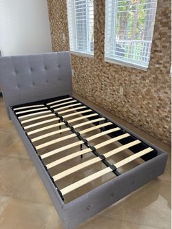 2 matching twin bed frames