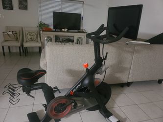 Peloton professional exercise bike is in excellent condition with tennis shoes included

￼


