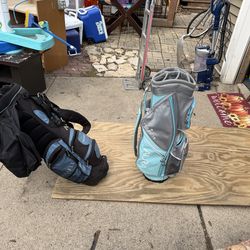 2 Golf Bags, Maxifi With Legs, Aura Stand Bag, all zippers work, $20 each