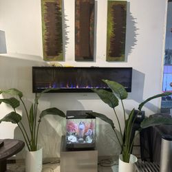 Fireplace With 3 Pieces Of Metal Art