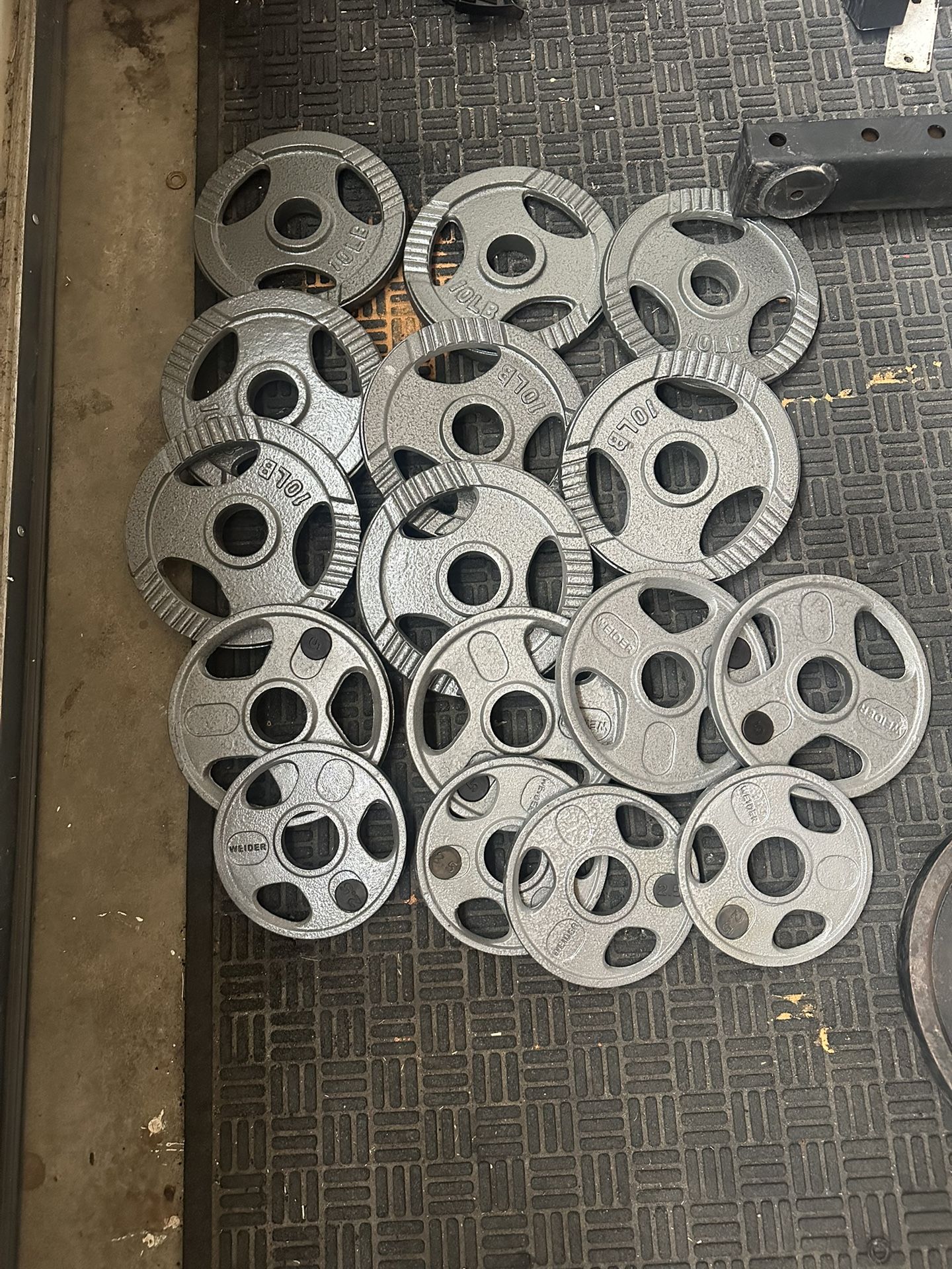 100lbs of Olympic weights firm price