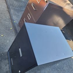 2 metal file cabinets...smaller one comes with keys.
