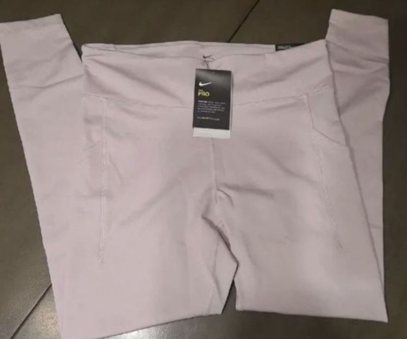 Nike PRO Stealth LUXE Mid Rise Leggings with side Pockets Light Purple  pinkish women size small for Sale in White Marsh, MD - OfferUp
