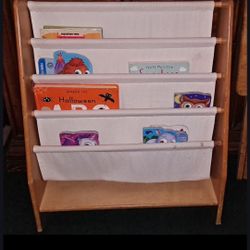 Bookcase With A Few Children's Books