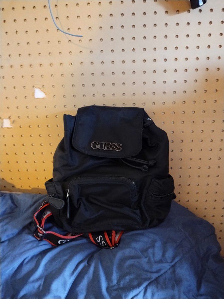 Guess. Purse Backpack