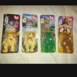 Set of 4 TY Beanie Babies Glory,  Erin,  Britannia, And  Maple the Bear McDonalds 1999. New, unopened, plastic packing is yellowed.