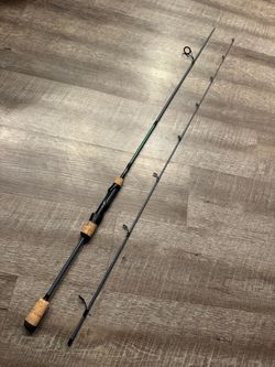 Bass Pro ultra light 7’ spinnig fishing pole.