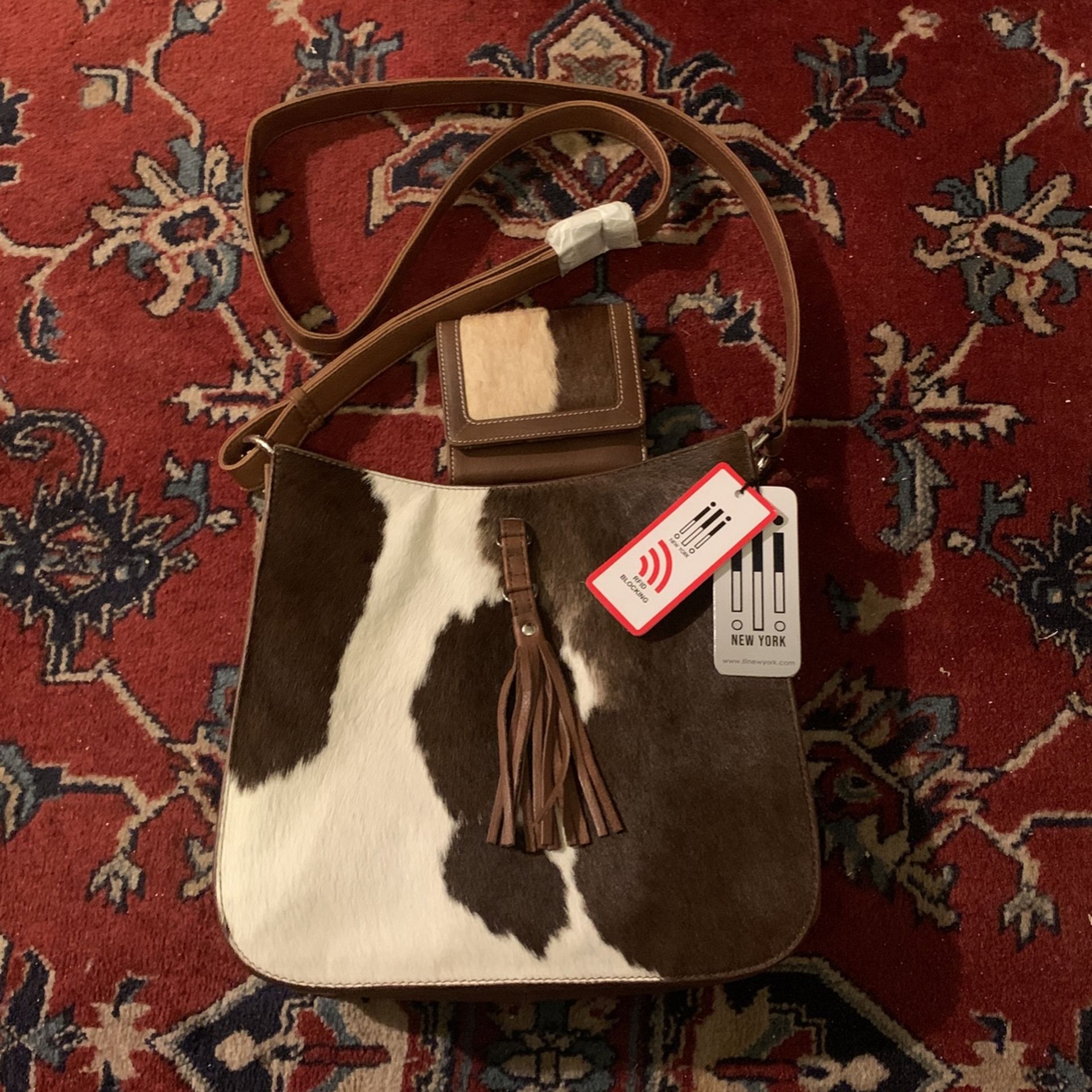 Cowhide Bag And A Wallet