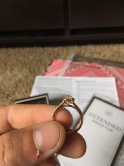 Rose gold Diamond engagement ring plus wedding band.