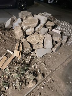Landscaping stones, Dirt and concrete blocks.