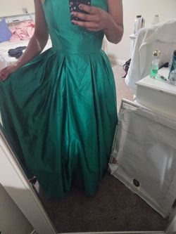 Medium size green puffy prom dress