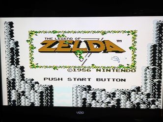 Nintendo NES Bundle – 2 Zelda Games + NES Advantage
