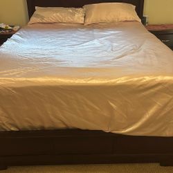 Queen Size mattress And Box springs and Frame, two Nightstands 