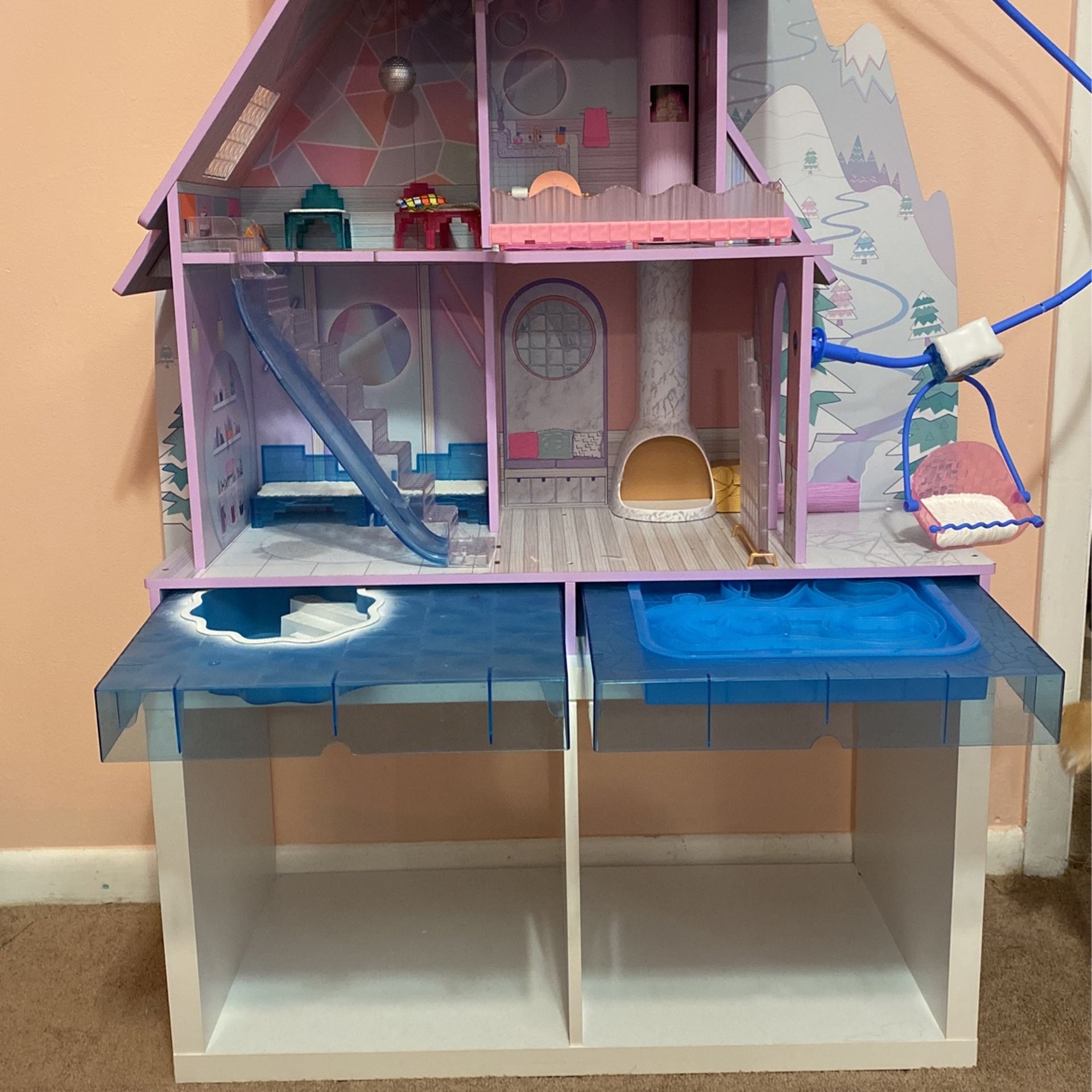 LoL Chalet doll house with all the surprise accessories to go along with it pool, skating ring, and electric snow chimney And  Sled ride